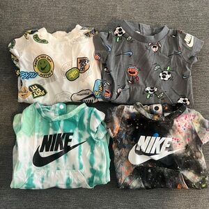 Bundle of 4 Nike Baby Boy one piece rompers - Newborn